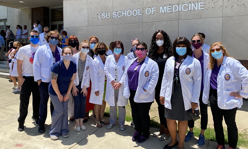Group of nurses standing outside LSU School of Medicine