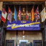 A purple and gold LSU banner with the words Focused For The Future.